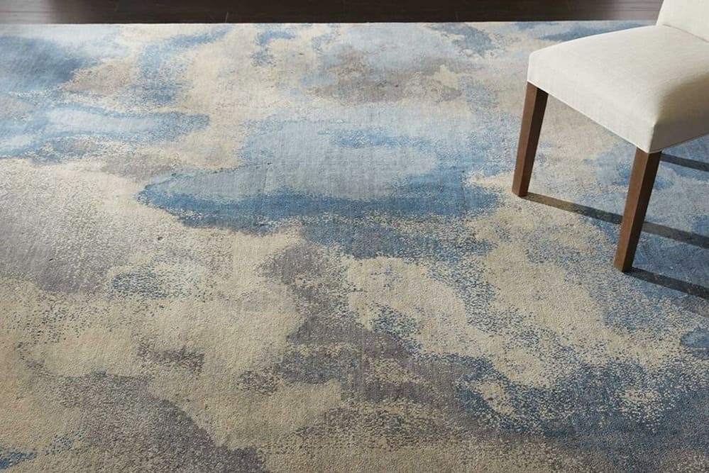Cloud style area rug, blue and white hues throughout